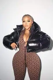 Lil' Kim Is an Unapologetic Queen Bee