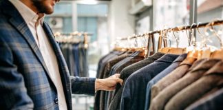 Check Out Some Great Men’s Style Tips For 2022 Businessman trying suit in store