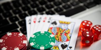 Principles Of Online Casinos That Makes It Popular Among Wagers Poker chips and cards on computer keyboard