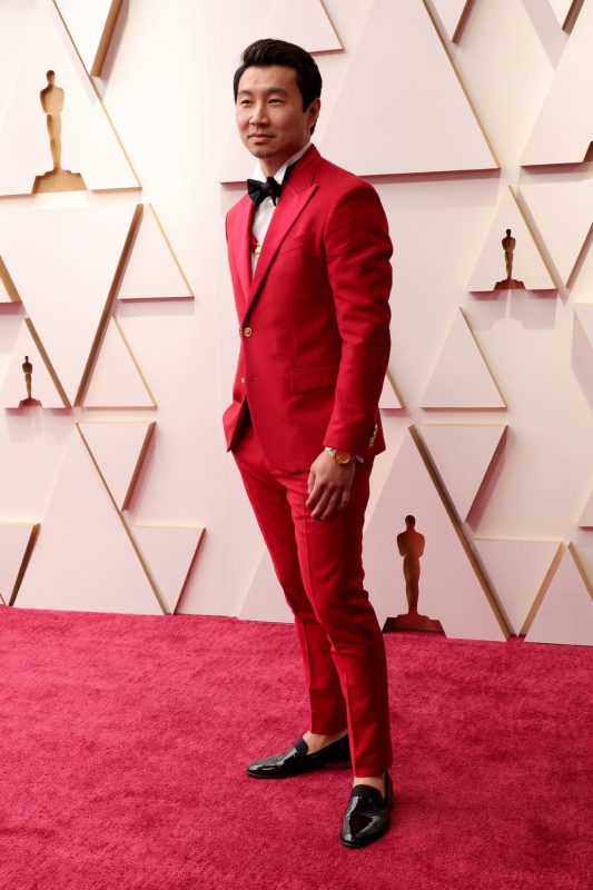 Shang-Chi and the Legend of the Ten Rings actor and Oscars presenter Simu Liu wore a red Versace suit with gold detailing. 