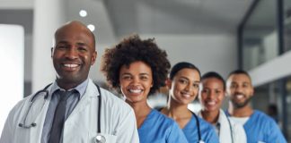 Seven Ways To Advance Your Healthcare Career Portrait of a group of medical practitioners standing in a line in a hospital