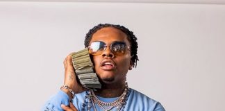 Rappers Boasting About Their Flashy Lifestyles, Wearing Designer Rapper Gunna Flashy Fit With Money to his ear