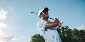 Improve Your Golf Game With These Practical Tips Like man practicing to help improve your golf game