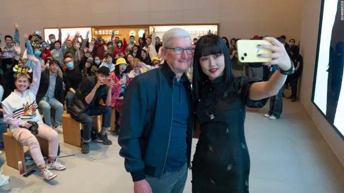 After TikTok chief's grilling in Washington, Apple's Tim Cook is all smiles in Beijing | CNN Business