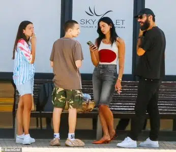 Taking a Moment: On a leisurely day in Ibiza, Spain, 27-year-old Dua Lipa indulged in a brief smoke break, accompanied by her new partner, Romain Gavras, 42. Joining them were Dua Lipa's younger sister Rina, 22, and her brother Gjin, 17.