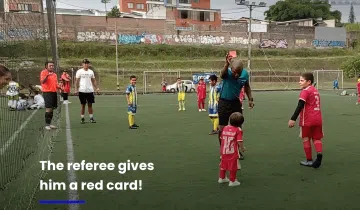 Kid gets red card during soccer game