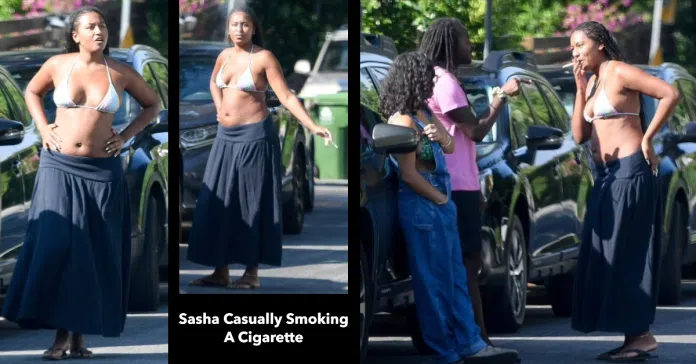 Sasha casually smoking a cigarette