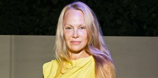 Pamela Anderson Stuns in Chic Yellow Dress at Paris Fashion Week Pamela Anderson Stuns in Chic Yellow Dress at Paris Fashion Week