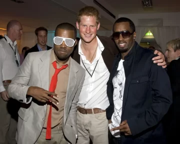 Prince Harry (center), Diddy (right) and Kanye West at the 2007 “Concert for Diana” event. 