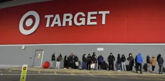 Target Employees Delight Swifties with Free Coffee During Eras Tour Book & Vinyl Rush! Target employees handing out coffee for Swifties