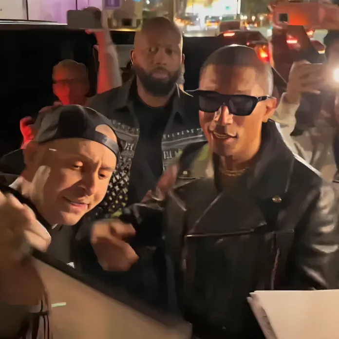 Pharrell yelled at by animal rights protesters