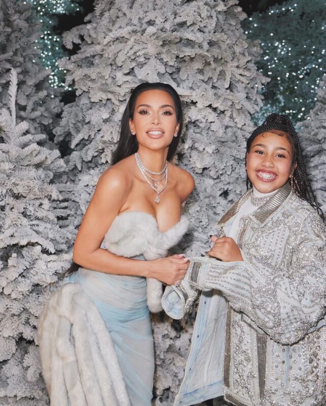 Kardashian Christmas singing video Ariana Grande