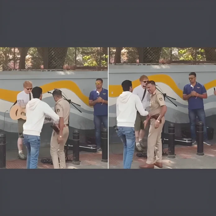 police officer stops Ed Sheeran street performance India