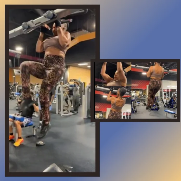 70-year-old woman doing pull-ups at the gym
