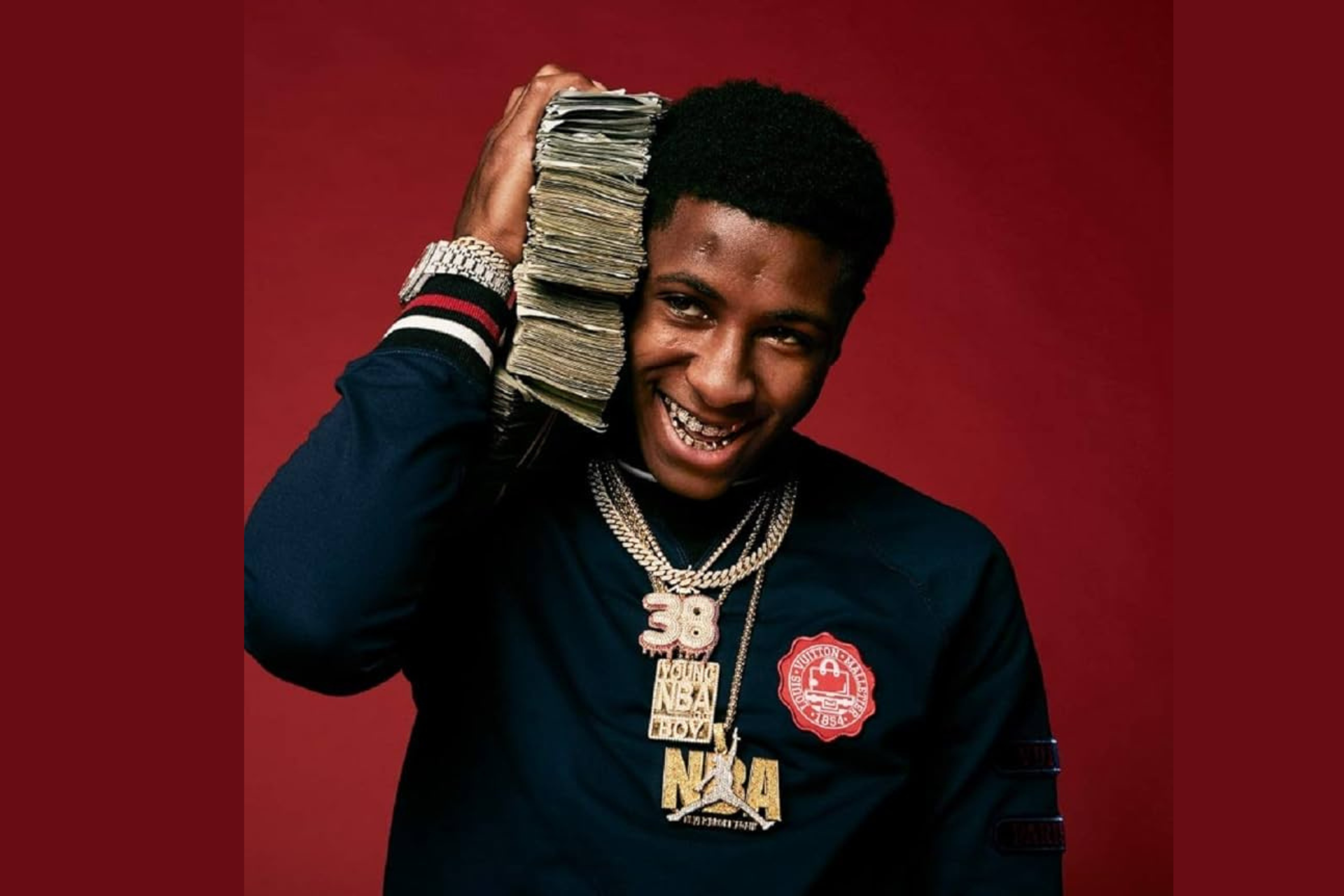 NBA YoungBoy Shows Off Hidden Vault Stuffed With Gold Bars & Cash