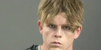 Arkansas Man Accused of Killing Parents in Front of Kids Caught on Barber Shop Cam arkansas man arrested during haircut