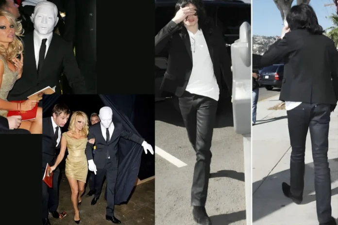Pamela Anderson appeared at a 2008 London fashion show alongside a mysterious masked companion