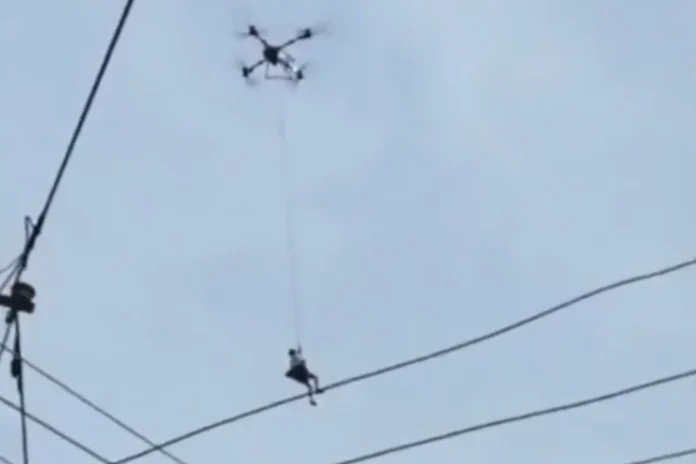 china flood drone rescue man on roof