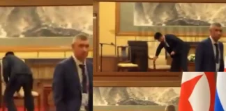 Kim Jong-un’s Security Team Wipes Down Chair After Putin Meeting member of Kim Jong-un's security detail thoroughly wiped down the chair he used