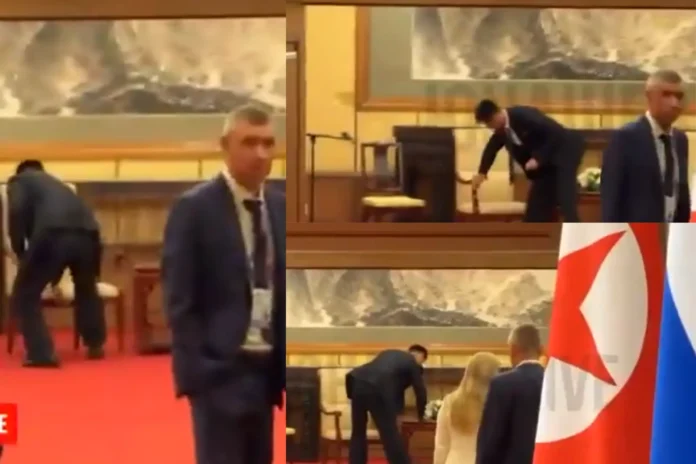 member of Kim Jong-un's security detail thoroughly wiped down the chair he used
