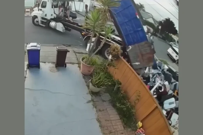 dump truck driver unloads trash