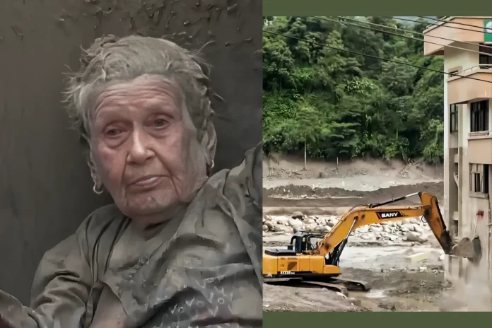97 year old woman survives Nepal floods collapsed building