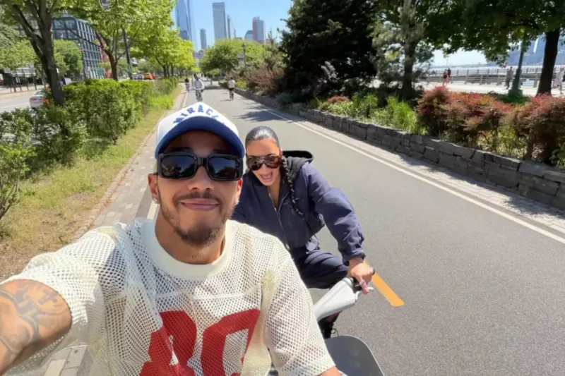 Kim Kardashian cuddles Lewis Hamilton’s new golden retriever