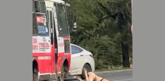 Russian Woman in Underwear Involved in Street Crisis Incident Russian woman crisis middle street incident car