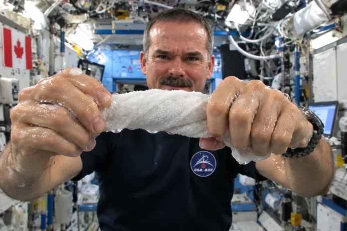 Chris Hadfield wet washcloth in space