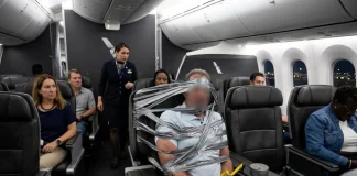 Passengers Duct-Tape Violent Passenger to Seat on American Airlines Flight passengers duct tape man seat violent American Airlines flight