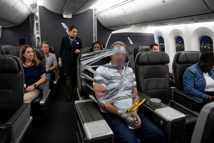 passengers duct tape man seat violent American Airlines flight