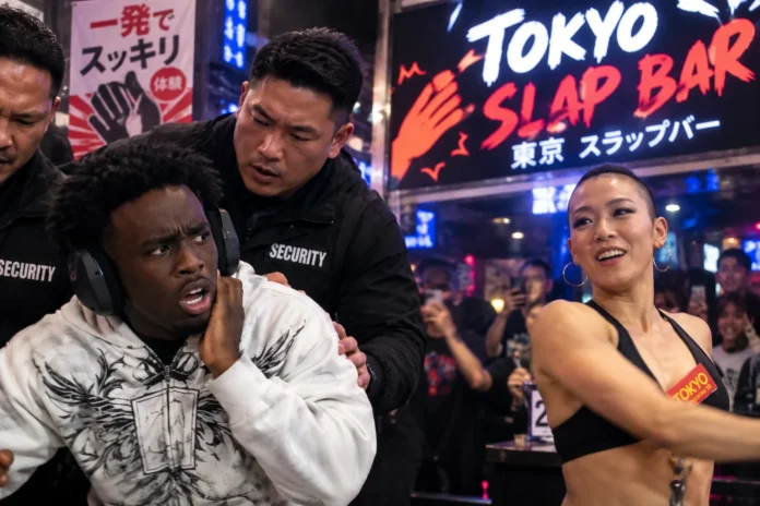 Kai Cenat Retreats to Security After Getting Slapped at Tokyo Slap Bar